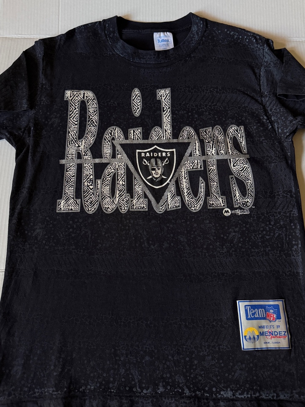 Vtg 1990's Tultex LA / Oakland Raiders Black T-Shirt All Over Print Men's Size L